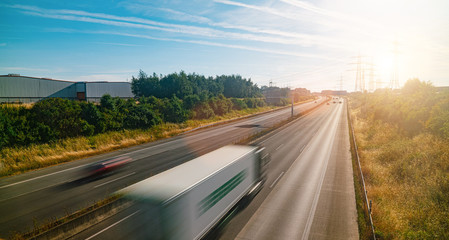 Lots of Trucks and cars on a Highway - transportation concept