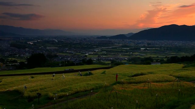 Zoom out view of landscape at sunrise
