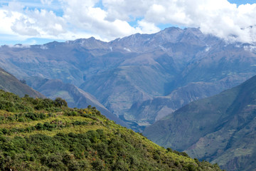 Landscape with green deep valley, Apurimac River canyon, Peruvian Andes mountains on Choquequirao trek in Peru