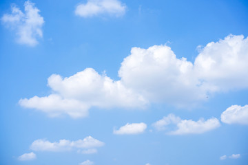 Fototapeta na wymiar Beautiful background of a clouds in the blue sky close up.