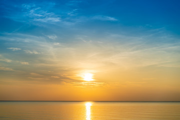 Naklejka na ściany i meble Beautiful sunrise sky over the sea background.