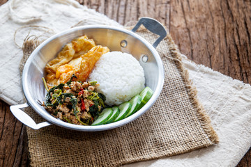 Original fried basil with pork served with jasmine rice and fried egg.