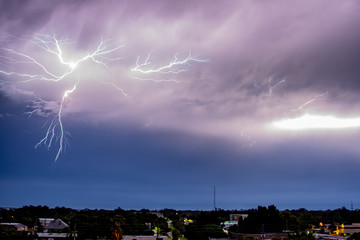 Lightening bolt streaking across the dark stormy sky