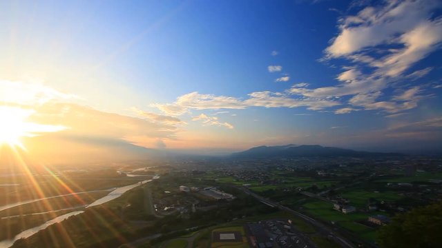 Panning shot of Chikuma River, Ueda City and Uedahara, Japan