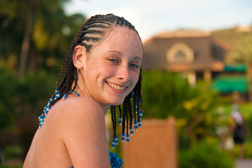 Young teenage girl with braided corn row hair in the Caribbean, St. John, USVI.