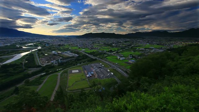 Panning shot of Chikuma River, Ueda City and Uedahara, Japan
