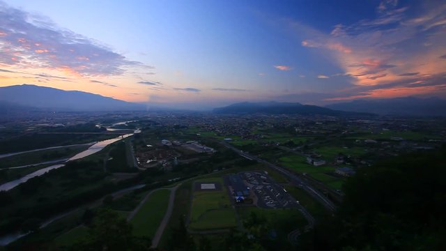 Panning shot of Chikuma River, Ueda City and Uedahara, Japan