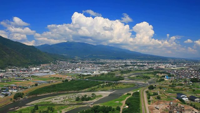 Zoom out of Chikuma River, Ueda City and Uedahara, Japan