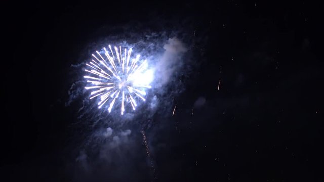 Footage of Dazzling fireworks in the night sky.