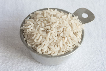 Uncooked White Rice in a Measuring Cup