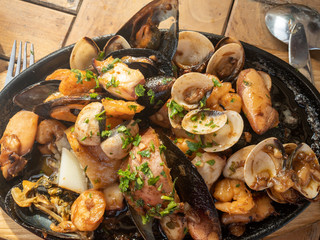 Exquisite food with seafood and rustic potatoes, healthy and natural food.