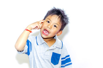 happy little asian  boy  in studio, fashion kids portrait white bacground.