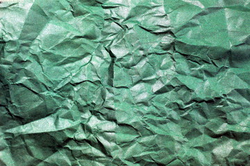 Texture of crumbled paper. background of mint old leaf closeup