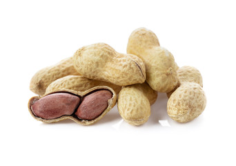 Dried peanuts isolated on white.