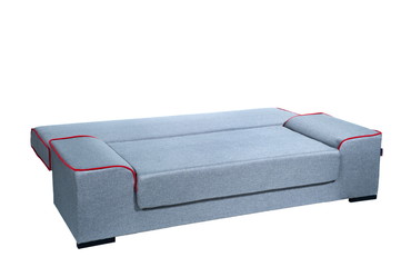 Folding sofa standing on a white background isolated