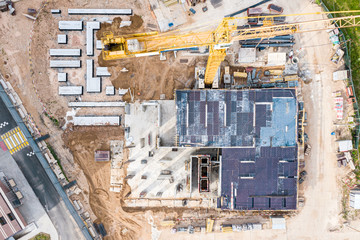 aerial top view of city construction site. monolithic frame construction of the building
