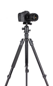 Camera on tripod isolated on a white background.