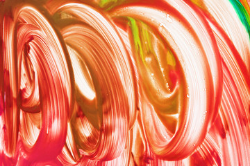 Beautiful abstract brushstrokes with colorful gouache paint on white paper for backgrounds 