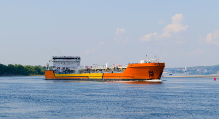 Orange tanker in the strait
