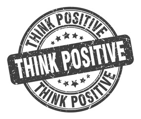 think positive stamp. think positive round grunge sign. think positive