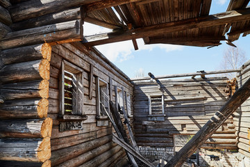 Old ruined house in the village on a summer day