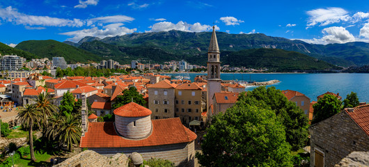 Budva Old Town from the Citadel with the Holy Trinity church and Adriatic Sea in the background in Montenegro, Balkans