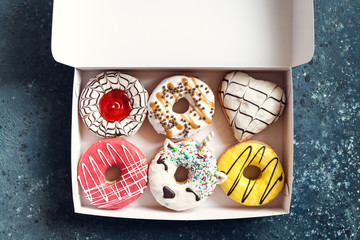 Donuts over dark background
