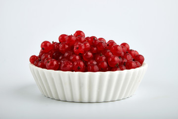 Redcurrant pile (Ribes Rubrum) with leaves. Clipping paths, shadow separated, infinite depth of filed