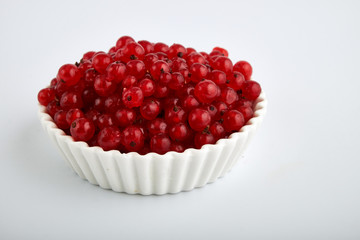 Redcurrant pile (Ribes Rubrum) with leaves. Clipping paths, shadow separated, infinite depth of filed