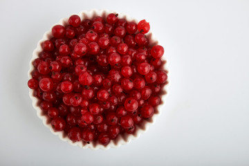 Redcurrant pile (Ribes Rubrum) with leaves. Clipping paths, shadow separated, infinite depth of filed