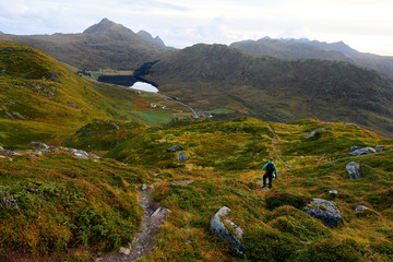 Hiking on top of a mountain on Lofoten Islands