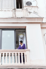 female with short haircut poses in Tbilisi loft