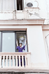 female with short haircut poses in Tbilisi loft