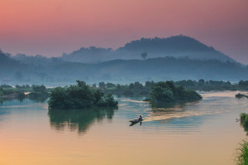 Naklejka premium Beautiful sunrise on Mekong river, border of Thailand and Laos, NongKhai province,Thailand.