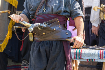 Haidutin belt with gun and sabre