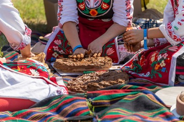 Fototapeta premium Making podnik or podnitsa pan from clay
