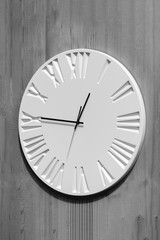 White clock with Roman numerals