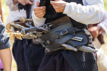 Haidutin belt with gun and sabre