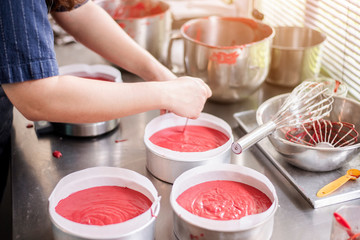 Beautiful woman is making bakery
