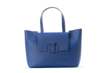 Capacious female purse handbag over a white background