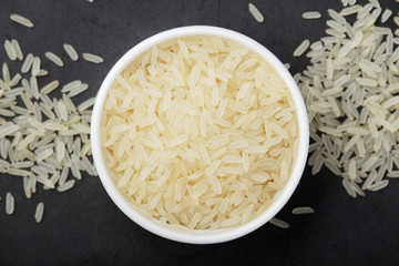 A glass bowl with white long-grain rice