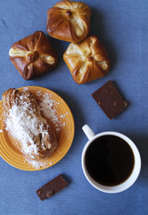 Tasty pastry and coffee breakfast top view