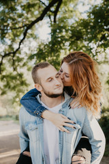 Happy loving couple outdoor in park .