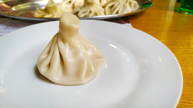 Georgian khinkali( dumplings) with diffent filling - mushrooms, meat and chease