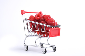  Fruit raspberry in a little metal basket isolated on white. Cart hand