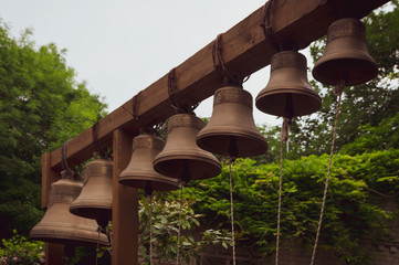 bells, a row of bells hanging on a wooden beam, Church street belfry, tinted image