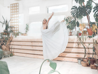 Portrait  of beautiful  balerina woman weared in white dress. Studio  shot,  natural  light © Olena Tkachenko