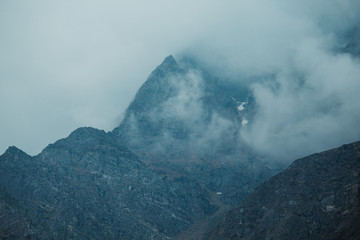 Mountains covered by clouds in Badrinath, Uttarakhand, India