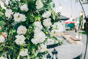 White flowers as decorations. Beautiful details at the wedding. Stylish bouquets.