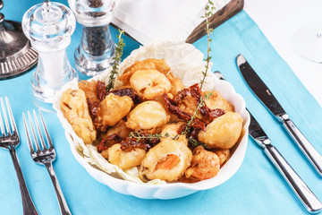 Mediterranean dish, salmon meat fried in butter served in rosemary dough